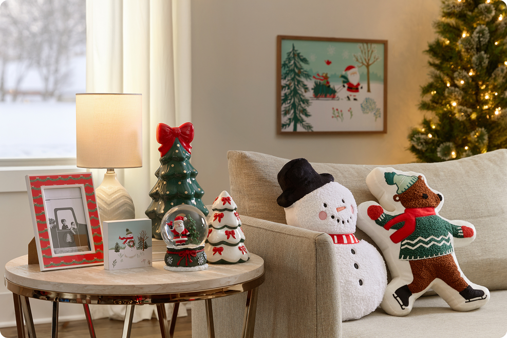 Celebrate the Holidays with festive pillows, tabletop décor, photo frames, and seasonal accents